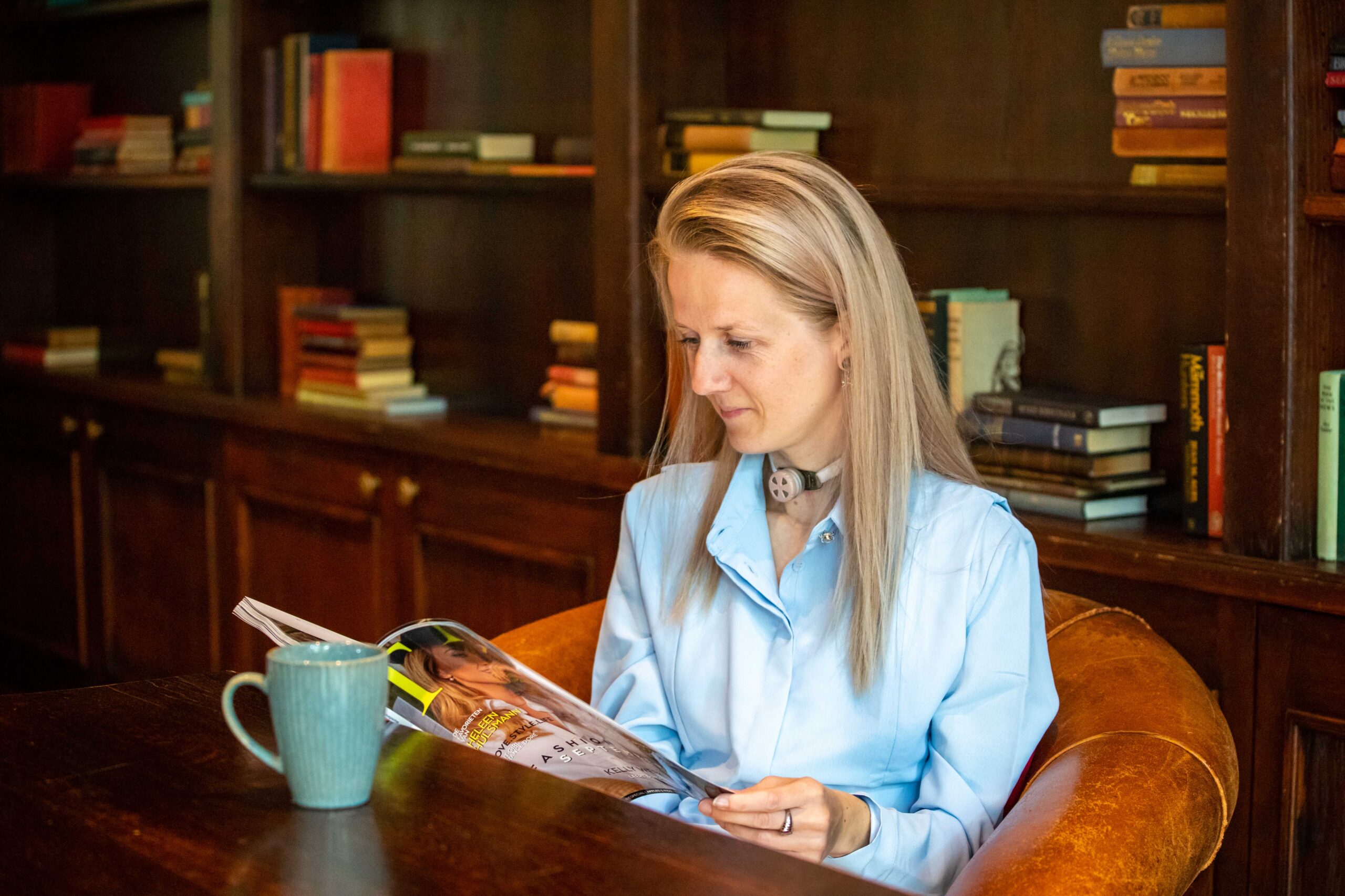 living-with-trachoestomy-woman-reading